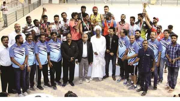 Organizers and winners in a group photo