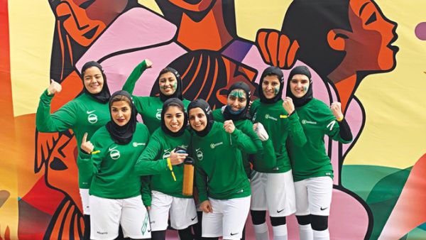 The Greens’ squad are using the plastic bottles they collected at the football stadium to create an art work that will highlight the harm plastic does to the planet. (Supplied photo)