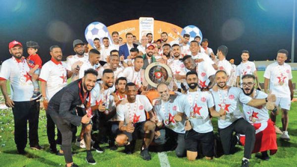 Dhofar players celebrating with the Omantel League trophy (Photo: Muscat Daily)