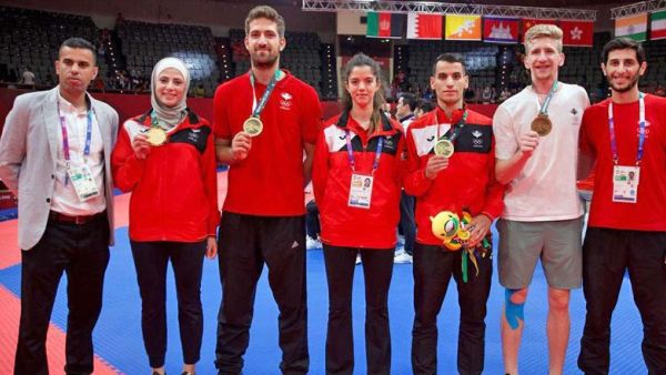In this undated photo, Jordanian athletes pose with their medals at the Asian Games in Jakarta, Indonesia, last year (Photo: Jordan Olympic Committee)