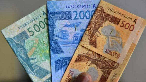  Some economists have urged West Africa to hold on to national currencies.