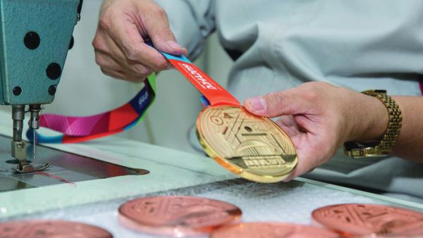 Specially designed medals showcase Qatar and pay tribute to athletics disciplines as more than 2,000 athletes prepare to compete for places on the podium