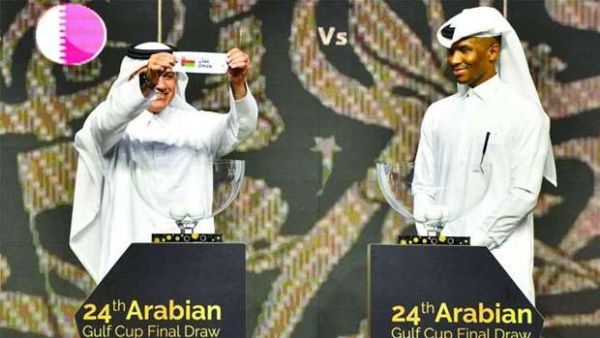 Former Qatari football captains Adel Malallah (L) and Belal Mohamed conduct the draw for the 24th Arabian Gulf Cup at the Marsa Malaz Kempinski, The Pearl – Doha on Wednesday.