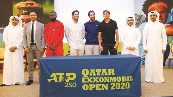 Tennis players Frances Tiafoe of the US (third left), Fernando Verdasco of Spain (fourth left), Jeremy Chardy of France (fifth left) and Makel Jaziri of Tunisia (sixth left) pose with tennis officials at the draw yesterday. (Photo: Gulf Times)