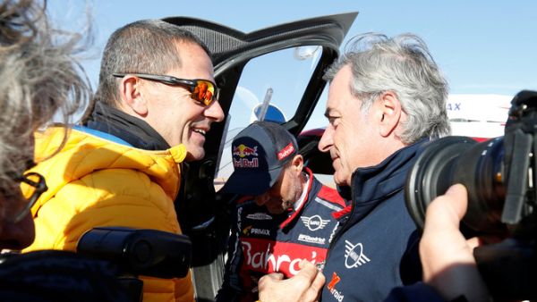 Bahrain JCW X-Raid Team's Carlos Sainz after winning the Dakar Rally alongside Yann Le Moenner, CEO of A.S.O.