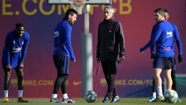 سيتيين وميسي خلال تدريبات برشلونة