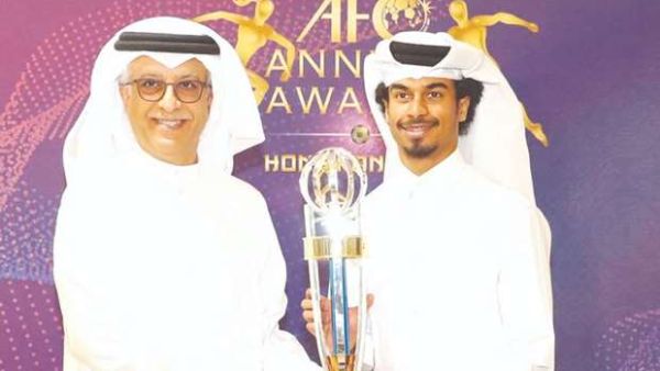 Qatar’s Akram Afif (R) receives the AFC Player of the Year Award from AFC President Sheikh Salman bin Ebrahim al-Khalifah