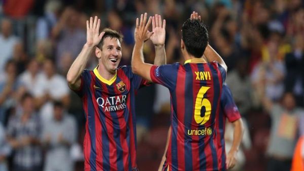 صورة أرشيفية لتشافي وميسي