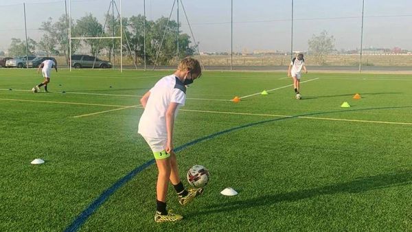 A player wearing a face mask seen attending a football training session in Dubai. (Supplied photo)