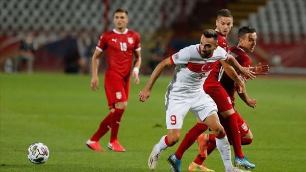 Home team Serbia focused on defensive play after team captain Kolarov's red card but secured one point against Turkey (Photo: AA)