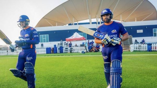 Mumbai Indians captain Rohit Sharma (right) goes out to bat during a practice match. (MI Twitter)