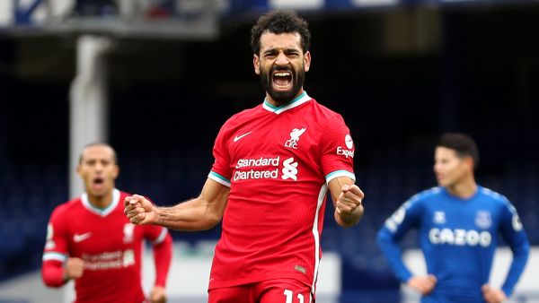 The Egypt international brought up a landmark at a remarkable time as the Reds drew 2-2 with their rivals in a dramatic fixture (Photo: goal.com)