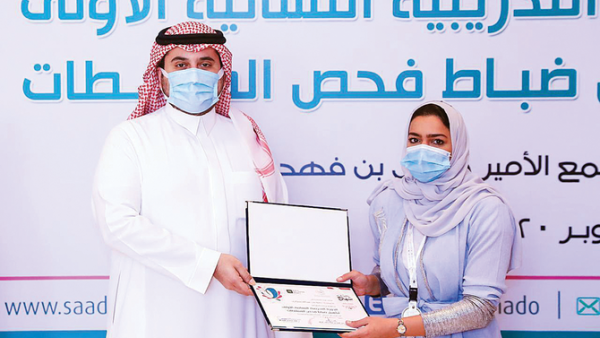 Prince Fahad bin Jalawi awarding doping control officer certificates to Saudi women after completion of their training course. (Supplied)
