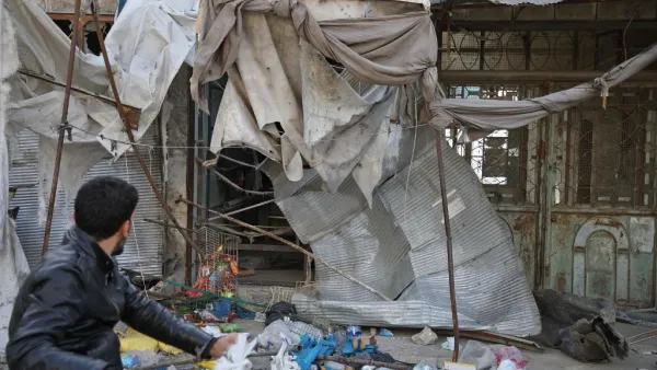 At least 12 people were killed and 18 others wounded in overnight strikes on the Idlib town of Maarat al-Numan, the Britain-based Syrian Observatory for Human Rights said. (Aaref WATAD / AFP)