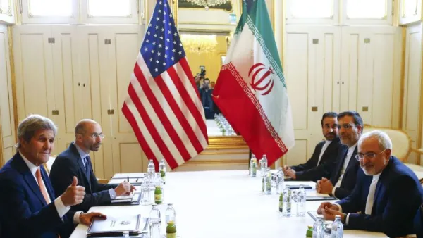 U.S. Secretary of State John Kerry, left, and Iran's Foreign Minister Mohammad Javad Zarif meet in Vienna, Austria. (Leonhard Foeger/AFP/Getty Images) 