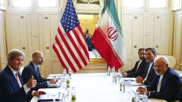 U.S. Secretary of State John Kerry, left, and Iran's Foreign Minister Mohammad Javad Zarif meet in Vienna, Austria. (Leonhard Foeger/AFP/Getty Images) 