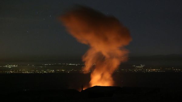 A fire rages and smoke billows following reported Syrian government forces' bombardment on the town of Khan Sheikhun in the southern countryside of Syria's Idlib province overnight on June 2, 2019. (AFP/File Photo)