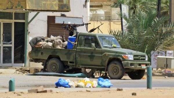 Members of Sudan's security forces rest under a military vehicle on June 6, 2019 in Khartoum. Sudan's health ministry has said "no more than 46" people died in a crackdown on Khartoum protesters, far fewer than the 108 dead reported by doctors close to the demonstrators. (AFP)