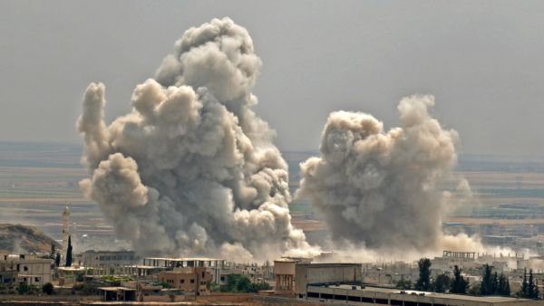 Plumes of smoke rise following reported Syrian government forces' bombardment on the town of Khan Sheikhun in the southern countryside of the jihadist-held Idlib province, on June 7, 2019. (AFP/ File Photo)