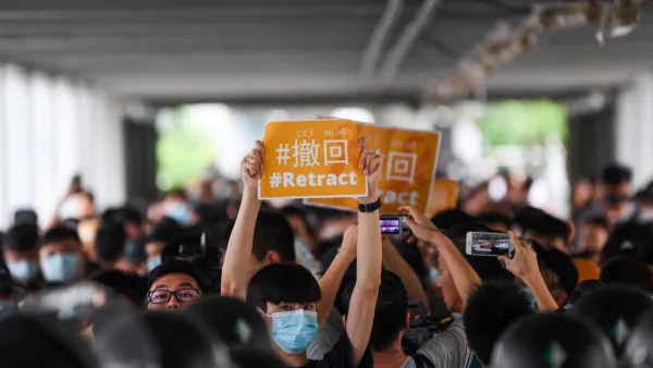 Asian markets fell again on June 13 with Hong Kong suffering a second straight day of heavy losses as investors fret over the impact of protests in the city and plans to introduce a controversial law allowing extradition to China. (Anthony WALLACE / AFP)