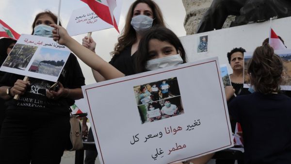 Activists gather in Beirut's Martyr Square during a demonstration on June 15, 2019, calling for a clean waste treatment plan.  (ANWAR AMRO / AA / AFP)