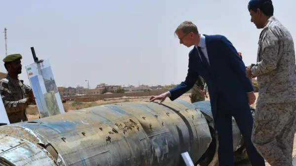 Brian Hook (2nd R), the US special representative on Iran, checks what Saudi officials said were Iranian remnants of a "cruise missile" that slammed into Abha airport on June 12, during a visit to an army base in al-Kharj, south of the Saudi capital Riyadh, on June 21, 2019. (AFP/ File Photo)
