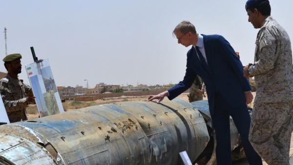 Brian Hook (2nd R), the US special representative on Iran, checks what Saudi officials said were Iranian remnants of a "cruise missile" that slammed into Abha airport on June 12, during a visit to an army base in al-Kharj, south of the Saudi capital Riyadh, on June 21, 2019. (AFP/ File Photo)