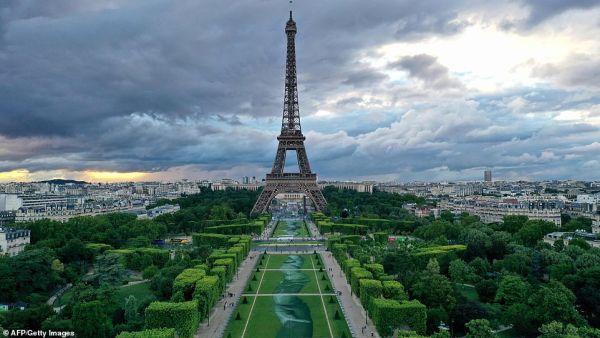 The stunning image has been painted directly on to the grass and will dissolve into the soil after only a few days and pedestrians will walk over it. (AFP/ File Photo)