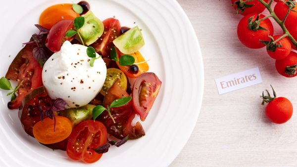 Emirates’ First and Business Class passengers travelling to and from Italy in August can look forward to an appetizer of the season’s heirloom tomatoes paired with burrata, an Italian cheese made from mozzarella and cream.