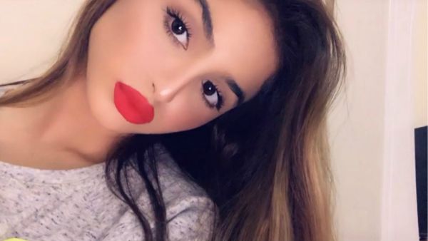 Hala chose a look with red lipstick to promote her new cosmetics line Source halamalturk Instagram