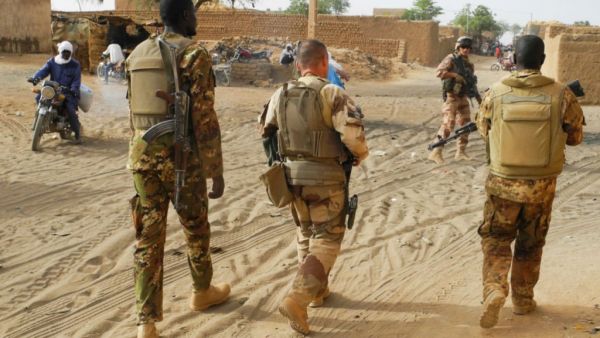 Soldiers from the Malian army patrol with soldiers from France's Barkhane Force in a street of Menaka. (AFP/ File Photo)