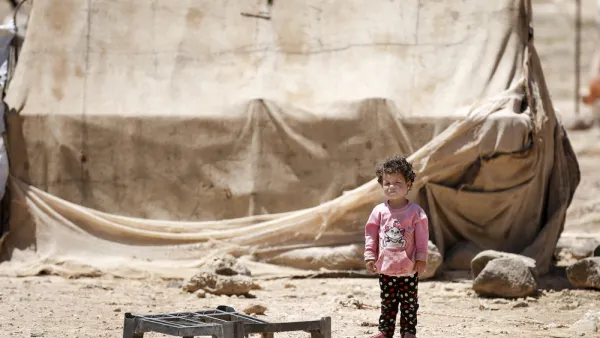  A syrian refugee child in front of his tent in Zaatari refugee camp. (Shutterstock/ File Photo)