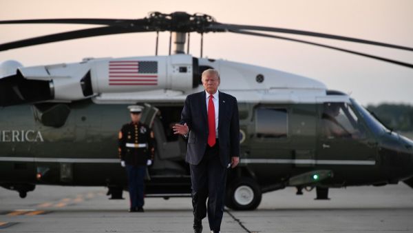 US President Donald Trump makes his way to board Air Force One before departing from Cleveland Hopkins International Airport in Cleveland, Ohio on July 12, 2019. (MANDEL NGAN / AFP)
