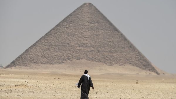 An Egyptian archaeological mission discovered a collection of stone, clay and wooden sarcophagi, of which some are still containing well preserved mummies, as well as a collection of wooden funerary masks and instruments used in cutting stones . Mohamed el-Shahed / AFP
