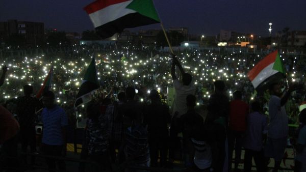Crowds of protesters were violently dispersed by men in military fatigues in a pre-dawn raid on a protest site outside army headquarters on June 3. (EBRAHIM HAMID / AFP)