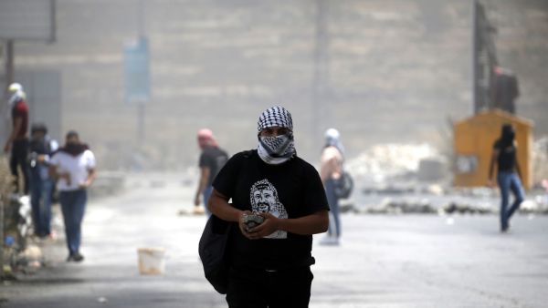 A Palestinian demonstrators  (AFP)