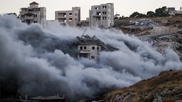 Demolition of a Palestinian building which was under construction, in the the Palestinian village of Sur Baher in East Jerusalem (AFP)