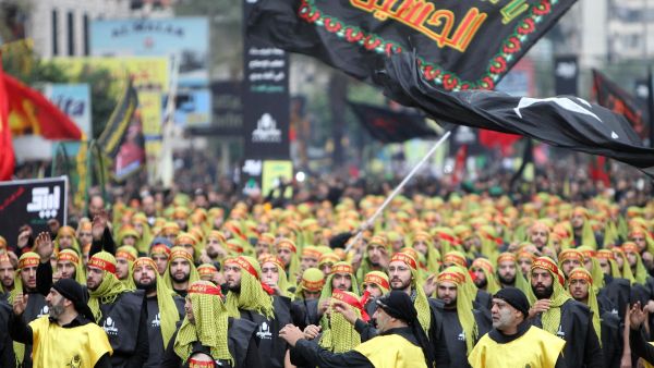 Supporters of Lebanon's Hezbollah movement take part in a parade. (AFP/ File Photo)