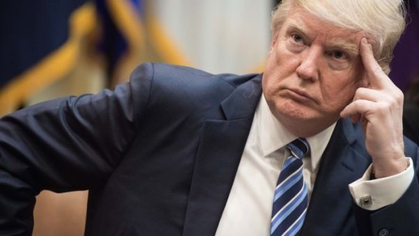 US President Donald Trump attends a meeting about healthcare in the Roosevelt Room at the White House in Washington, DC. (AFP/File)