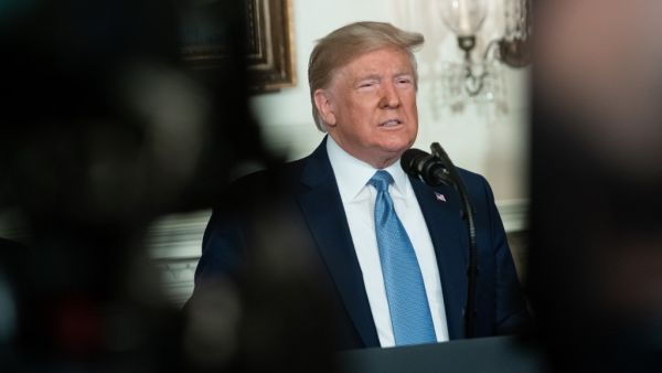 US President Donald Trump speaks about the mass shootings from the Diplomatic Reception Room of the White House in Washington, DC, August 5, 2019. (AFP/ File Photo)