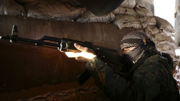 A Turkish-backed Syrian fighter poses in Tadef, near the city of al-Bab, in the eastern countryside of Aleppo province on August 6, 2019.  (Nazeer Al-khatib / AFP)