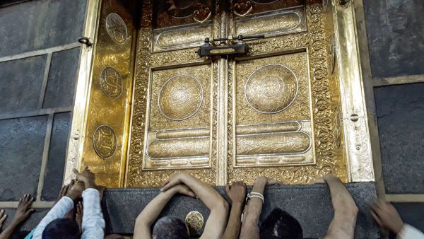 Muslims pilgrims gather outside the door of the Kaaba, Islam's holiest shrine, while performing the "Tawaf al-Ifada", a mandatory circumambulation during the annual Hajj. (AFP/ File Photo)