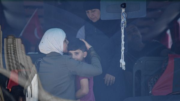 Syrian refugees (AFP)