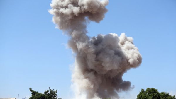 Smoke billows following a reported regime air strike on the eastern outskirts of Maaret al-Numan in Syria's northern province of Idlib on August 24, 2019. (Omar HAJ KADOUR / AFP)