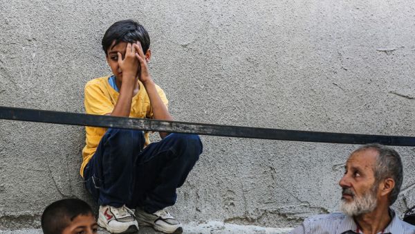 A boy relative of Hamas security member Salama al-Nadeem, 32, mourns during his funeral in Gaza City on 28, 2019. (AFP/ File Photo)
