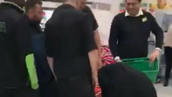 Five members of Asda security and staff crowded around the women as they were forced to reveal their spoils. (Daily Mail)