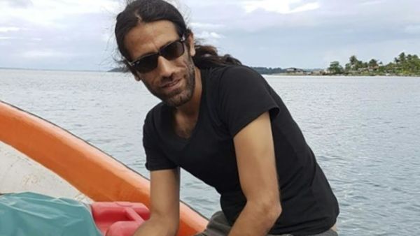 When Kurdish-Iranian journalist Behrouz Boochani won Australia's most valuable literary prize this week, he could not attend the ceremony to accept it. (AFP/ File Photo)