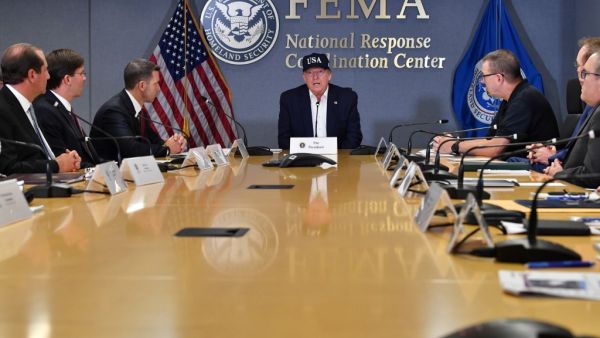 US President Donald Trump receives a briefing at the Federal Emergency Management Administration (FEMA) on Hurricane Dorian in Washington, DC, on September 1, 2019. (AFP/ File Photo)