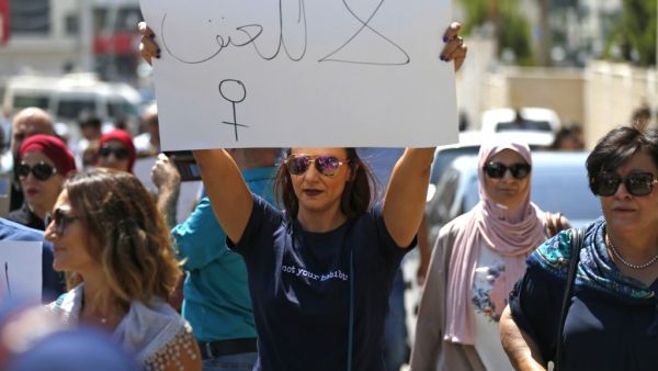 Palestinian women protest in support of women’s rights outside the prime minister’s office in the West Bank city of Ramallah (AFP)