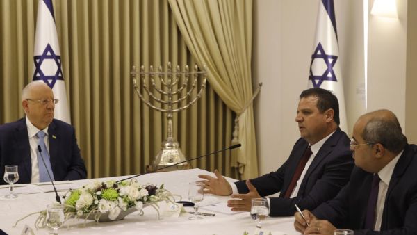 Israeli President Reuven Rivlin listens to members of the Joint List Ayman Odeh (2nd-R) and Ahmad Tibi (R) during a consulting meeting, to decide who to task with trying to form a new government, in Jerusalem on September 22, 2019. (Menahem KAHANA / AFP) Israeli President Reuven Rivlin listens to members of the Joint List Ayman Odeh (2nd-R) and Ahmad Tibi (R) during a consulting meeting, to decide who to task with trying to form a new government, in Jerusalem on September 22, 2019. (Menahem KAHANA / AFP)